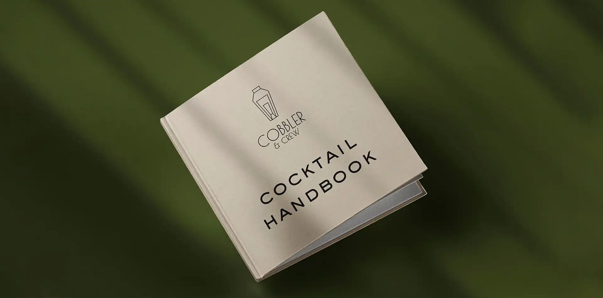 Cover of Cobbler and Crew cocktail book.
